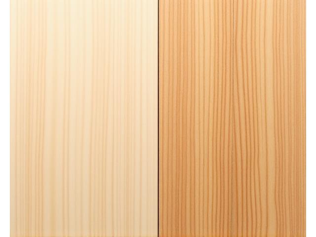 A sample of wood treated with a natural, non-toxic oil finish next to an untreated piece, highlighting the subtle enhancement and protection.