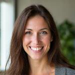 Headshot of Sarah Jenkins, a smiling woman with warm, approachable features.